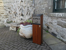 Free standing stylish cigarette ash bin available in hardwood or recycled plastic or rugged sleeper style ideal for outside club houses, hotels, and bars. approx 1mtr in height and can be bolted to the ground if necessary (designed by John Hunter)